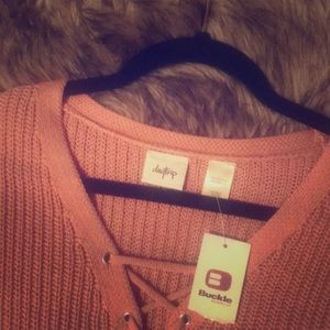 Daytrip never been worn. Buckle sweater.